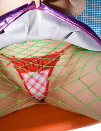 Asian babe Haruka Yagami lowering her fishnet stockings and subjugation