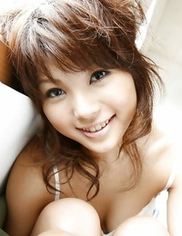 Stunning asian babe Azumi Harusaki uncovering her petite forms