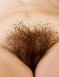 Hirsute mature girl shows the rosy of her really hairy pictures