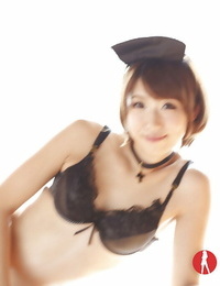 Small Asian honey Seira Matsuoka disrobing off maid uniform to stance nude