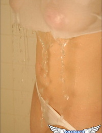 Cute teenager chick takes a shower with her witness thru clothes on her busty body