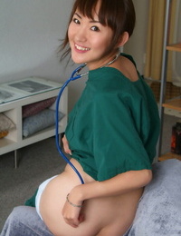 Asian beauty Kuki is demonstrating her bare small bra-stuffers on web cam