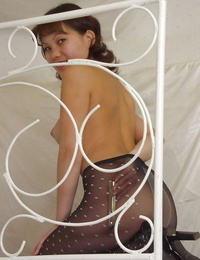 Nectar thai girl in pantyhose and lingerie top unveiling her bosoms