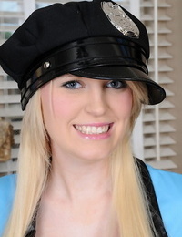 Amateur stunner Amanda Bryant posing in her absorbs police uniform