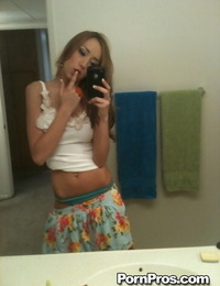 Teenage hotty Victoria Rae Dark-hued taking bare selfies in bathroom mirror