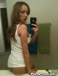 Teenage hotty Victoria Rae Dark-hued taking bare selfies in bathroom mirror