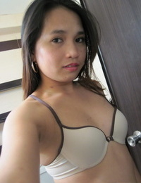 Tiny Asian girl shares self shots of her small hard nipples