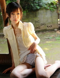 Tiny Japanese chick Aoba Itou models non bare in satin undergarments