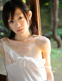 Tiny Japanese chick Aoba Itou models non bare in satin undergarments