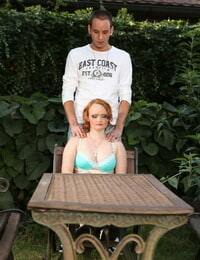Pale redhead face sits man in the backyard before tugging on his hard-on